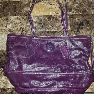 Gently used Purple/ burgundy Coach bag